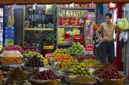 A man selling a fruit