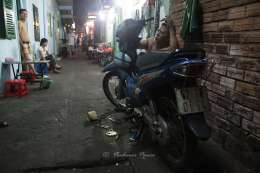 Repairing motorbike