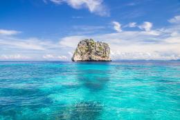 Island in crystal water